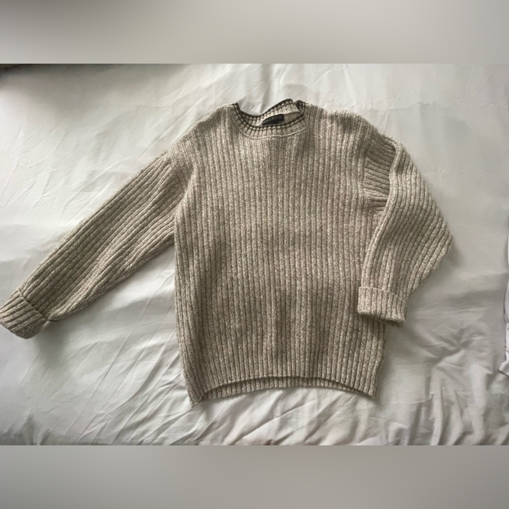 - Beige sweater. 65% cotton/35% wool